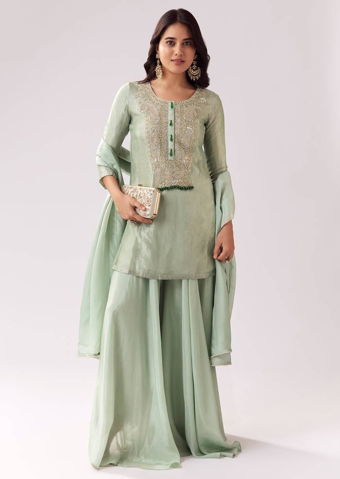 Emerald Green Celebration Pair – Zardozi Palazzo Suit For Her And Pastel Green Embroidered Linen Kurta Set For Him