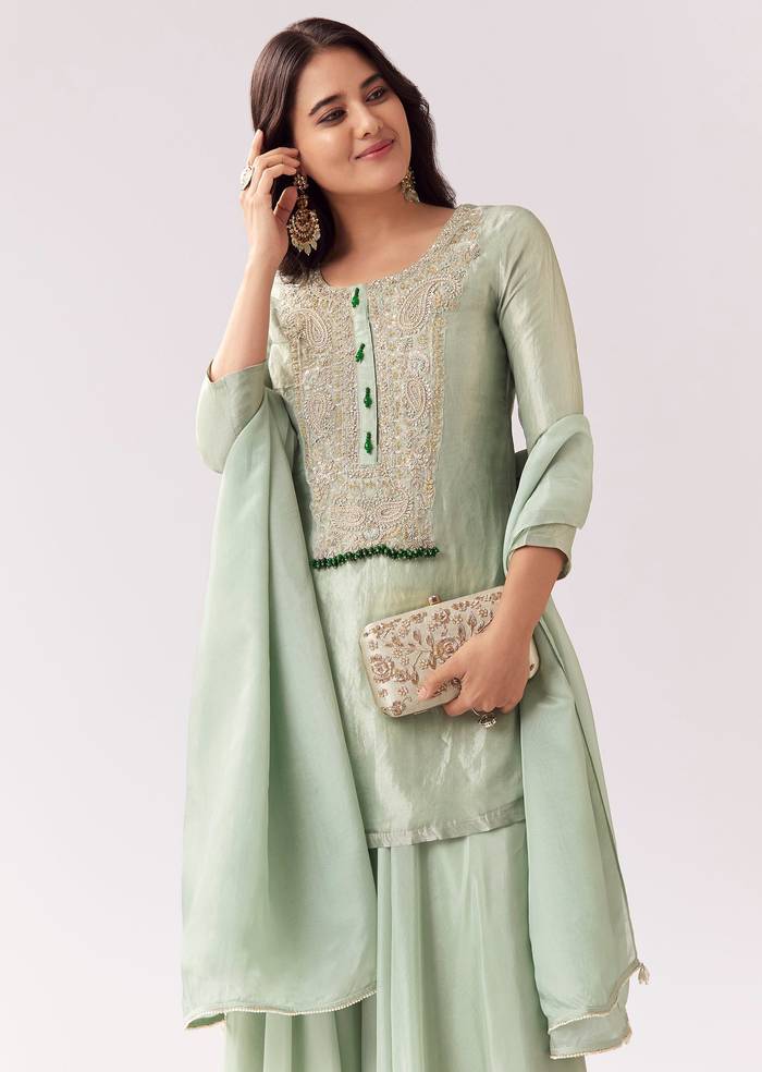 Emerald Green Celebration Pair – Zardozi Palazzo Suit For Her And Pastel Green Embroidered Linen Kurta Set For Him