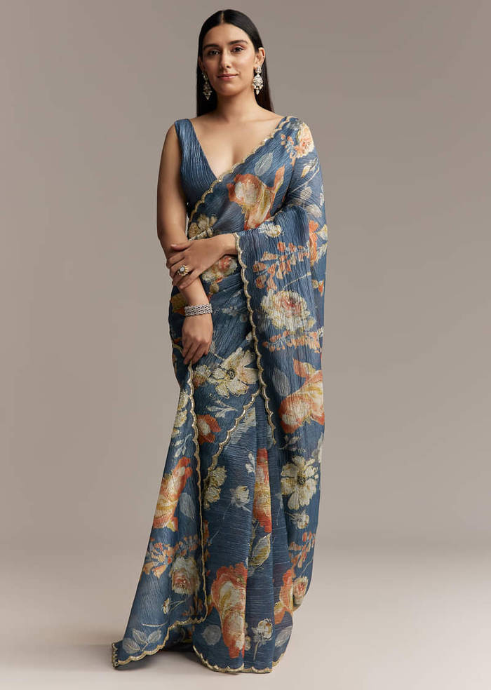 Teal Blue Tissue Saree With Floral Print And Embroidered Border