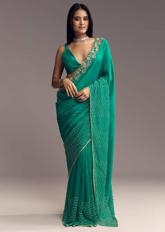 Teal Green Organza Saree With Cut Dana And Sequin Detailing