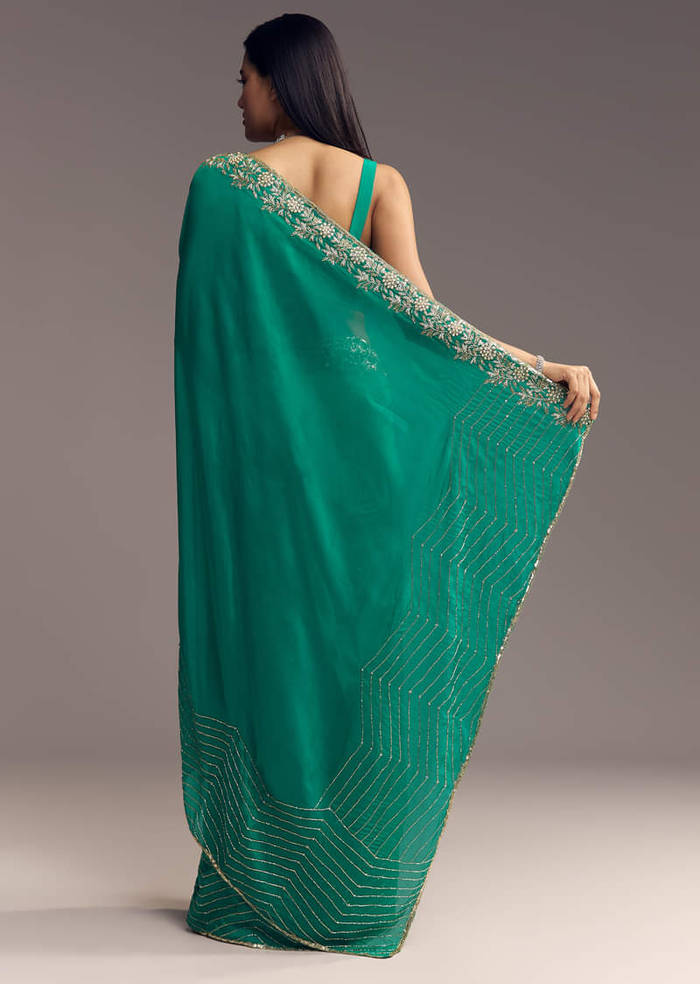 Teal Green Organza Saree With Cut Dana And Sequin Detailing