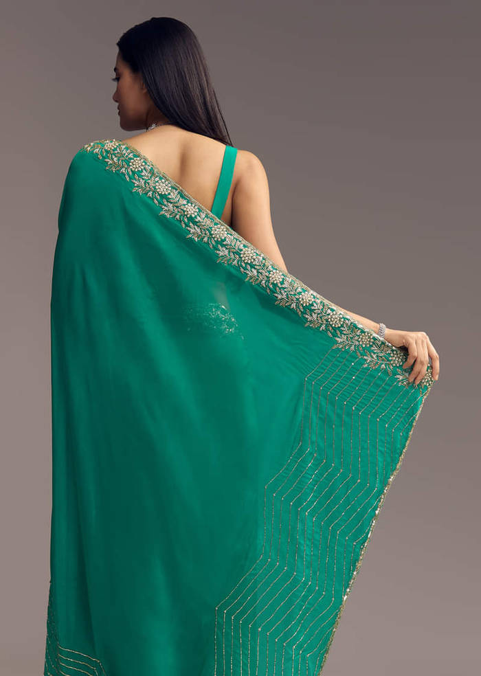 Teal Green Organza Saree With Cut Dana And Sequin Detailing