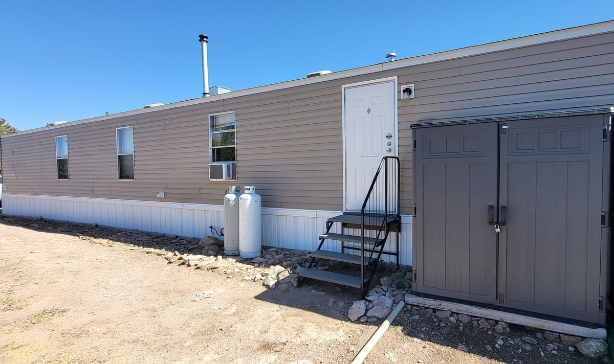 Back of home & Solar Building