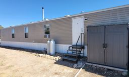 Back of home & Solar Building