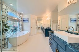 Spa-like bathroom attached to primary bedroom