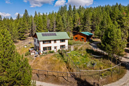 Lovely setting for house with 3 sided barn on 10+ acres.