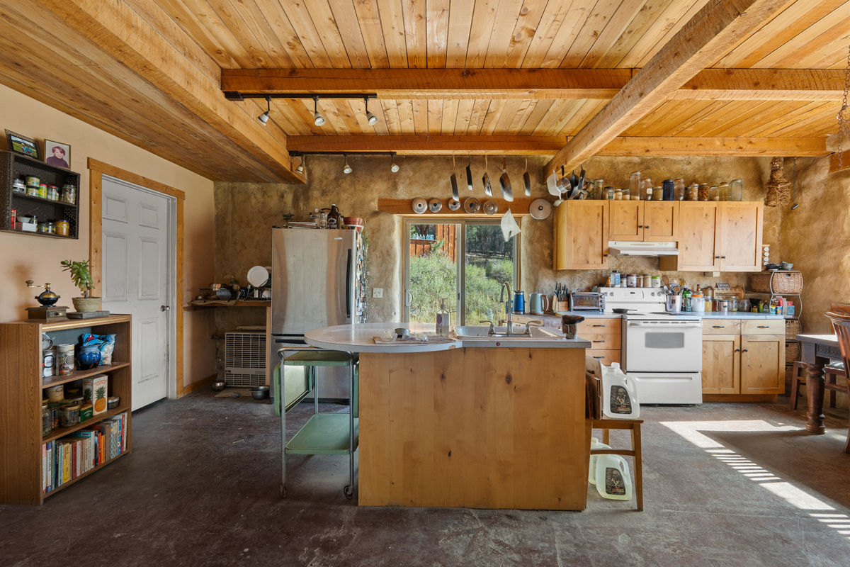 Functional kitchen with island work station.