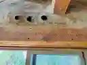 Bottle inlays and natural plaster walls.
