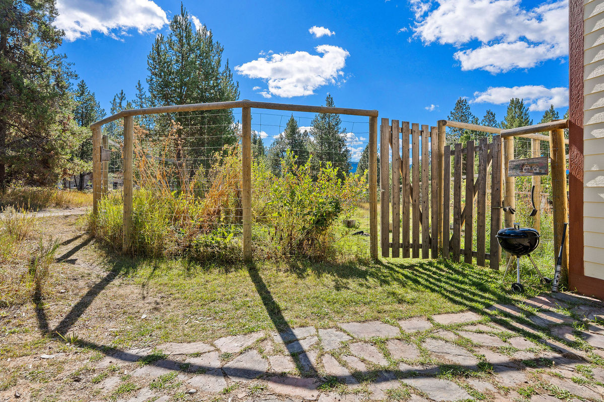 6' fence keeps animals out of garden.