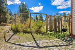 6' fence keeps animals out of garden.