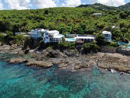 2 Homes with a pool in the middle