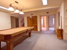 Den- Luxury pool table says with house