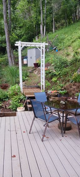 Pathway to the garden shed and tiered garden