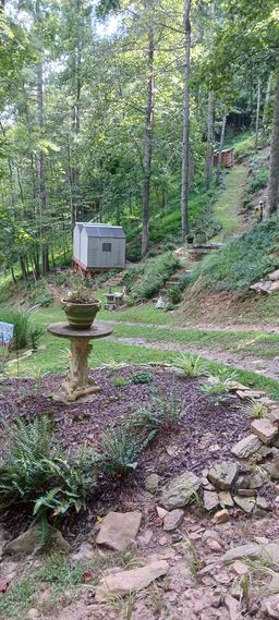 Two 10 x 10 storage sheds built on compost decking (stay with the sale of property)