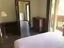 Connecting door between SE and SW bedrooms overlooking gardens in Lakeview Suite