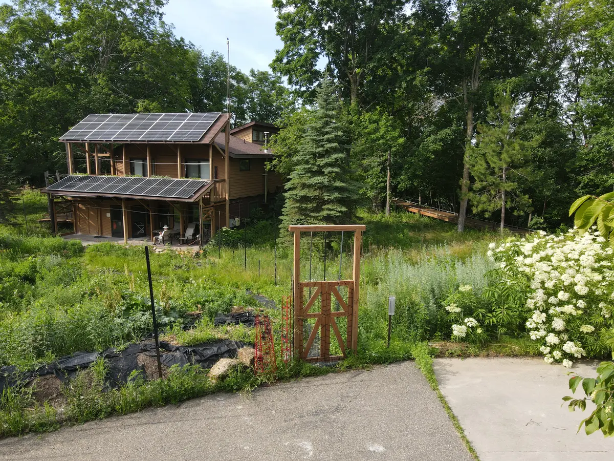 Gate in the deer fence surrounding the Hugelkulture and pollinator gardens