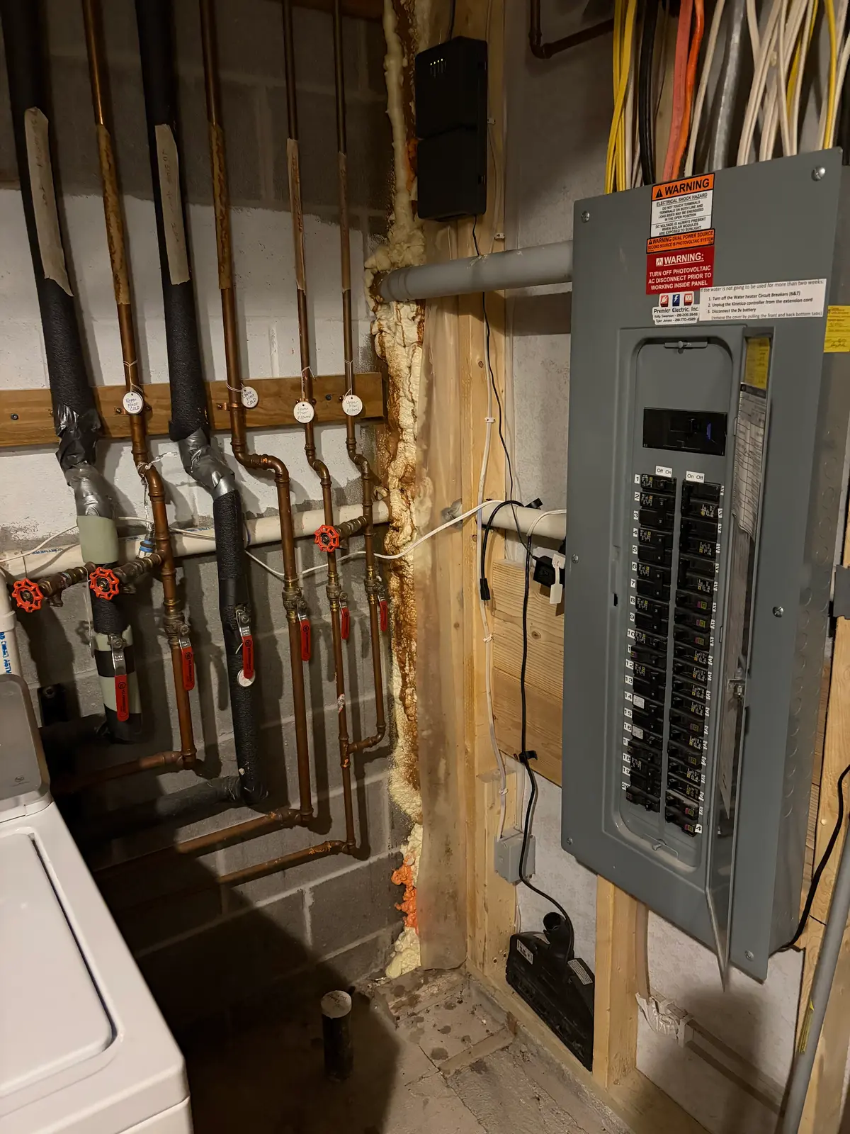 Copper pipe manifold for turning off water to upper level for winterization.