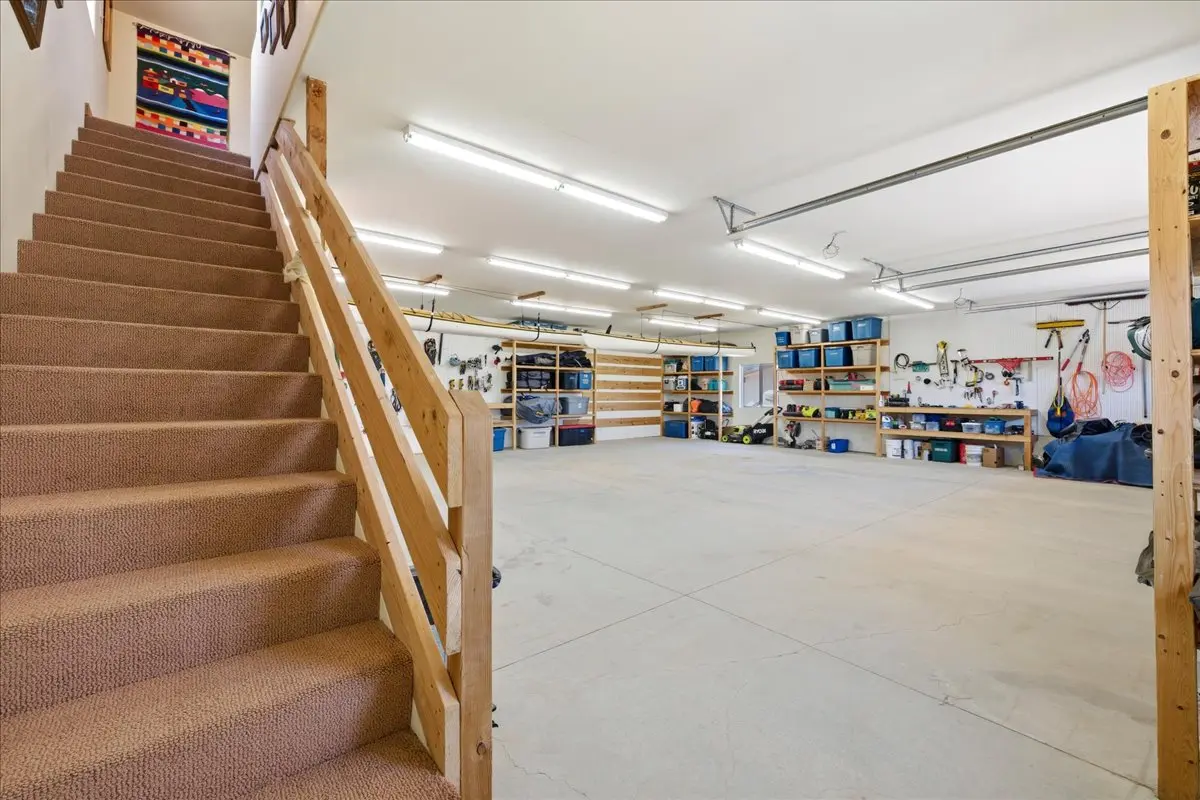 Garage Main House with stairs leading to loft