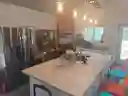 Kitchen with double oven and huge island