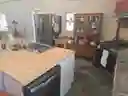 Kitchen Queen stays with the house (the truth window is right behind it)