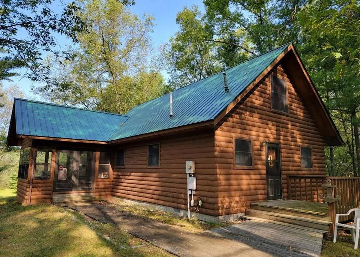 Photo 1 of green home in Irons, Michigan