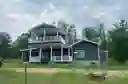 Photo 1 of green home in Ossineke Twp, Michigan