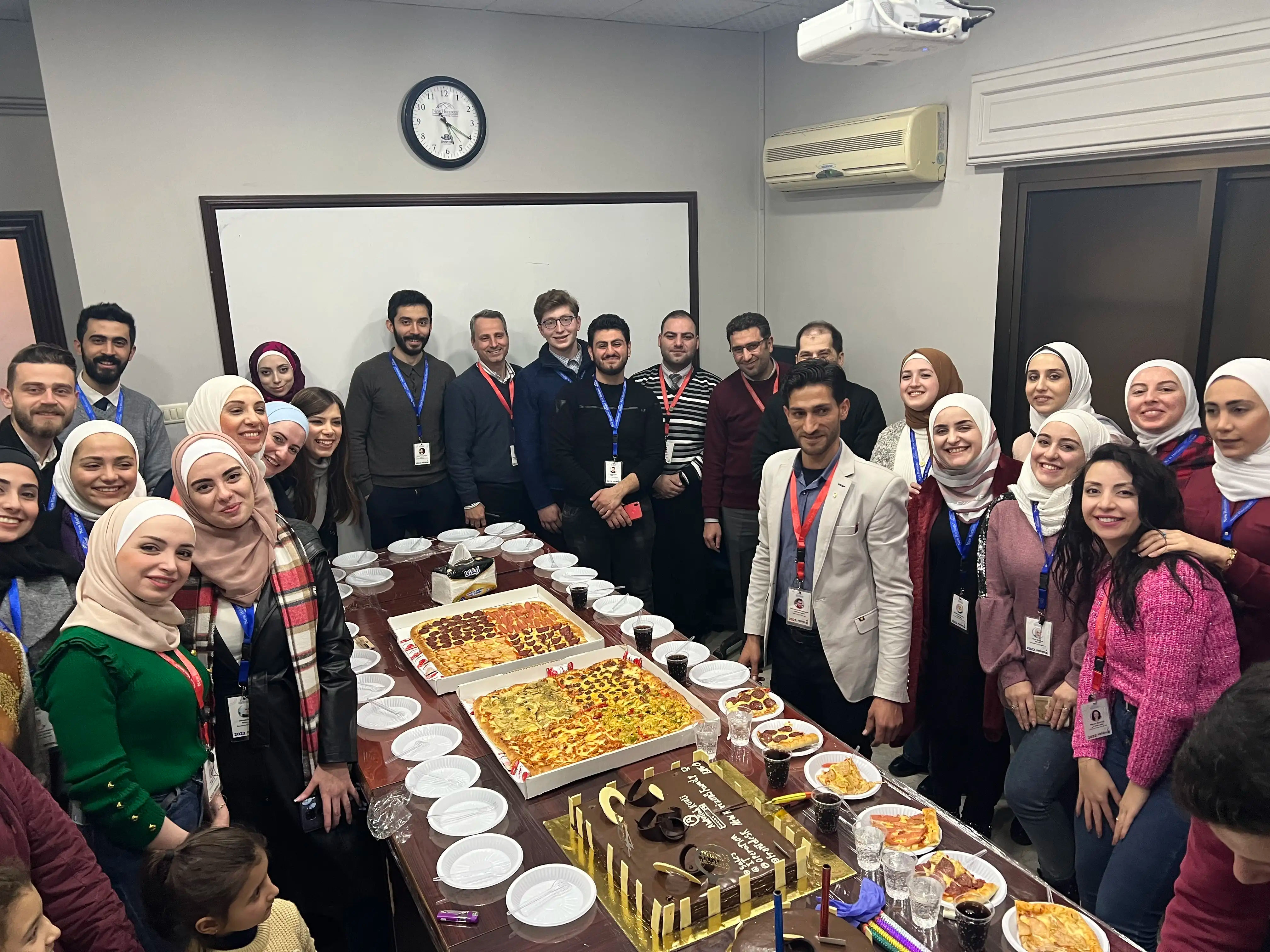 New Horizons team celebration with employees and management