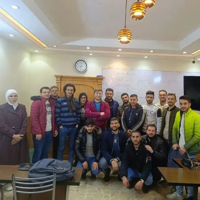 Celebrating student achievements during a CCNA course, focusing on networking fundamentals and hands-on problem-solving.