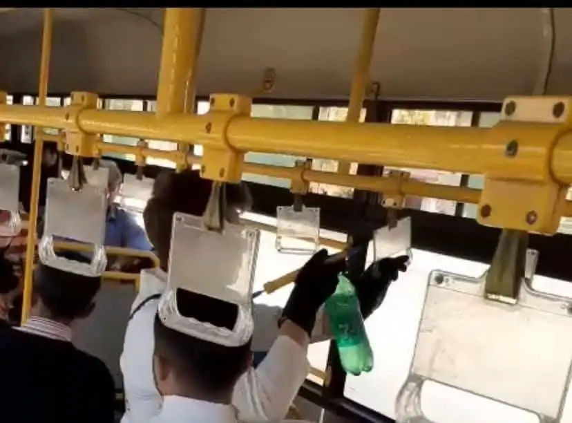 Disinfecting public bus handles to reduce bacteria and virus spread