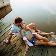 loving-couple-sitting-on-the-pier-on-lake-2022-04-19-00-17-29-utc_LIw9OvzXp.jpg