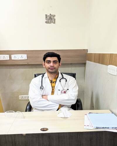 Dr. Ramit Singh Sambyal in his white Knee Length overcoat in Vasant Kunj, Delhi Dr. Ramit Singh Sambyal in his white Knee Length overcoat in Vasant Kunj, Delhi