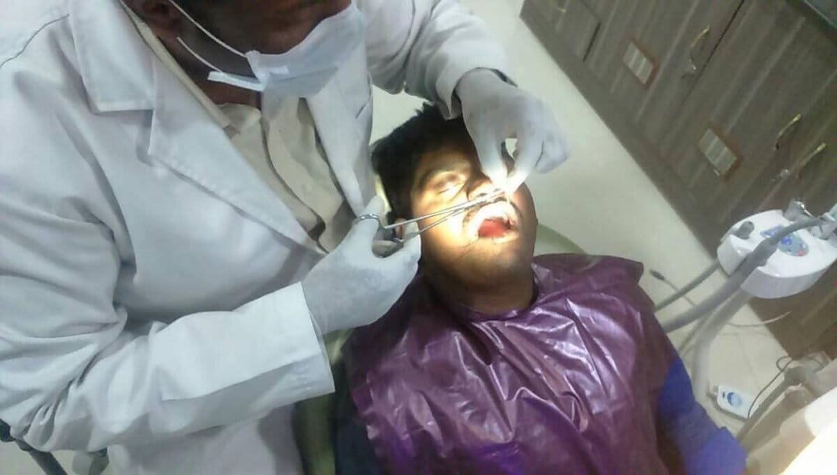 Dr.Ganesh Vaiyapuri performing a root canal procedure Dr.Ganesh Vaiyapuri performing a root canal procedure