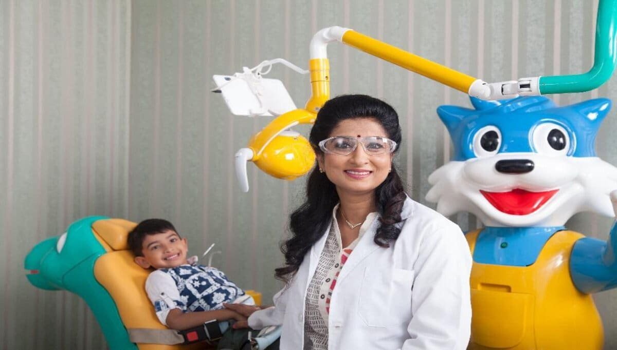 Our dentist conducting an oral health checkup for a child Our dentist conducting an oral health checkup for a child