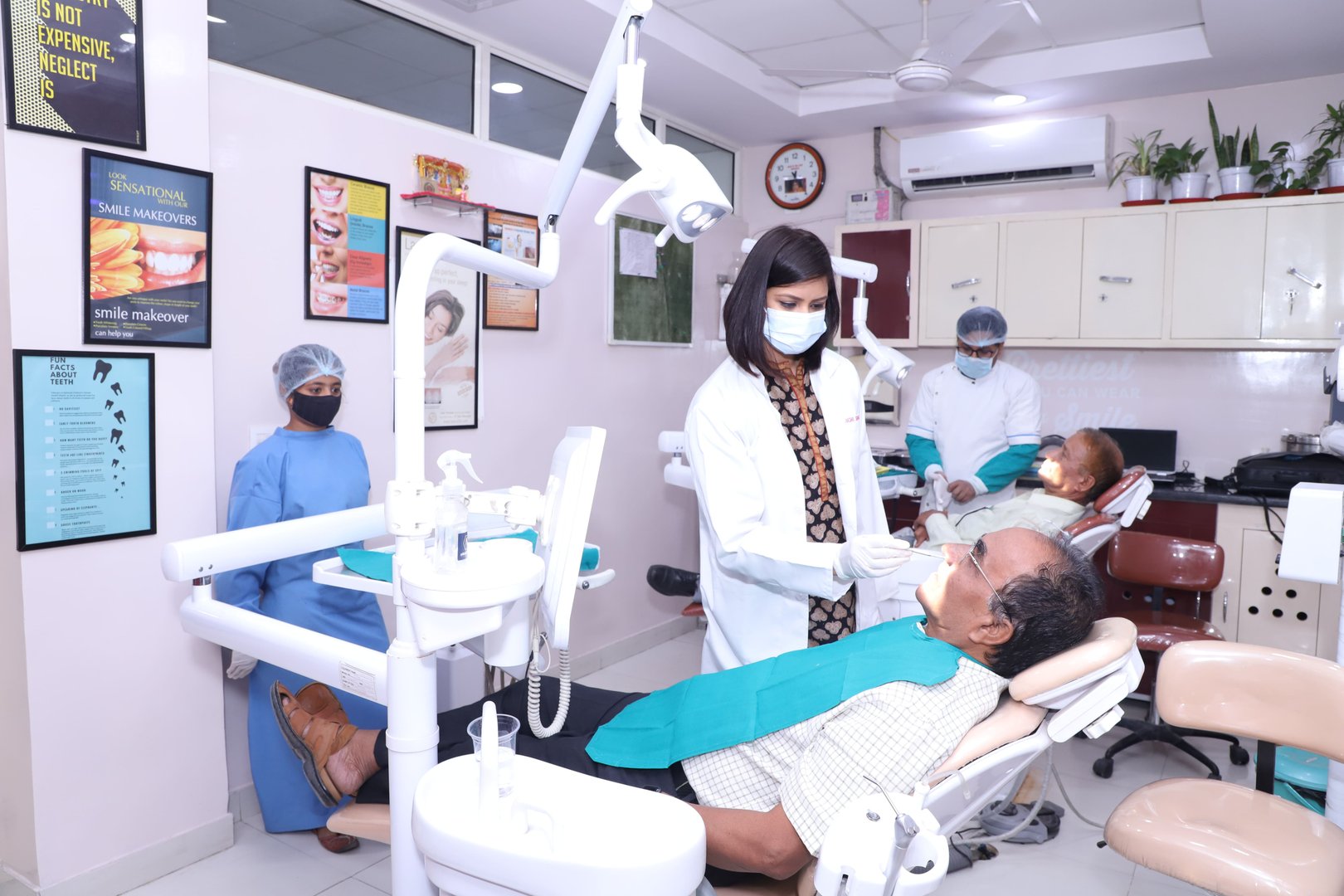 Dr Suchi Doing Dental Treatment in centre for Smiles, Noida Dr Suchi Doing Dental Treatment in centre for Smiles, Noida