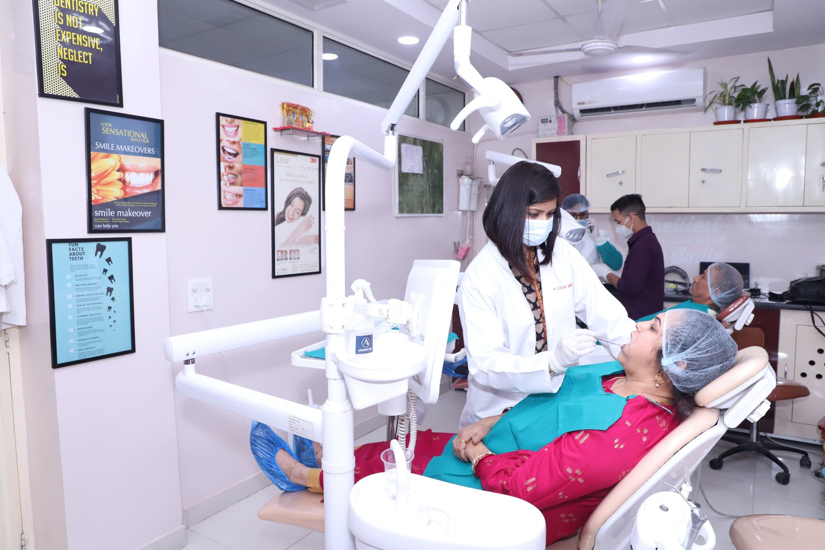 Dr Suchi Doing Dental Treatment in centre for Smiles, Noida Dr Suchi Doing Dental Treatment in centre for Smiles, Noida