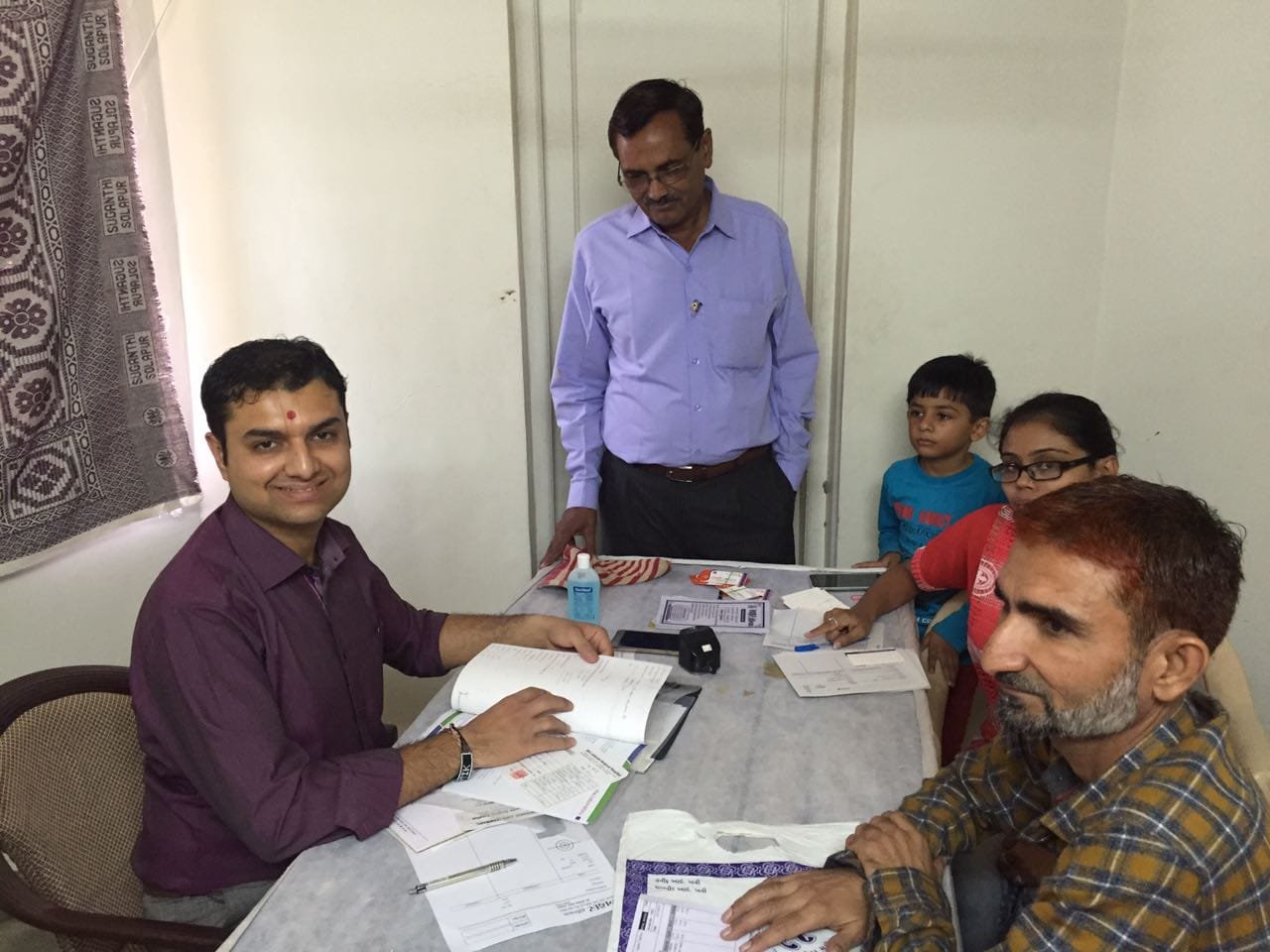 Dr. Dipesh doing medical examination of patients at Rotary Club Anjar Dr. Dipesh doing medical examination of patients at Rotary Club Anjar