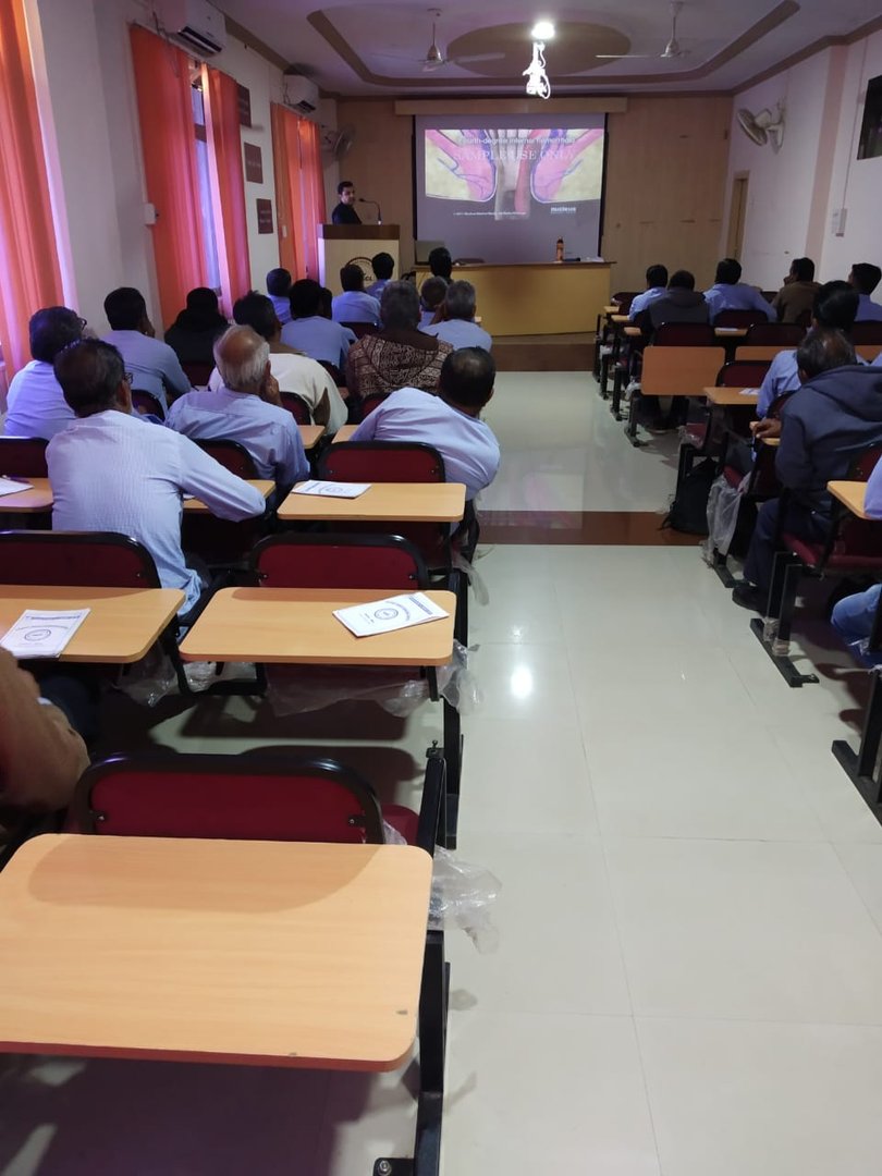 Dr. Dipesh explaining to employees of Paschim Gujarat Vij Company Limited