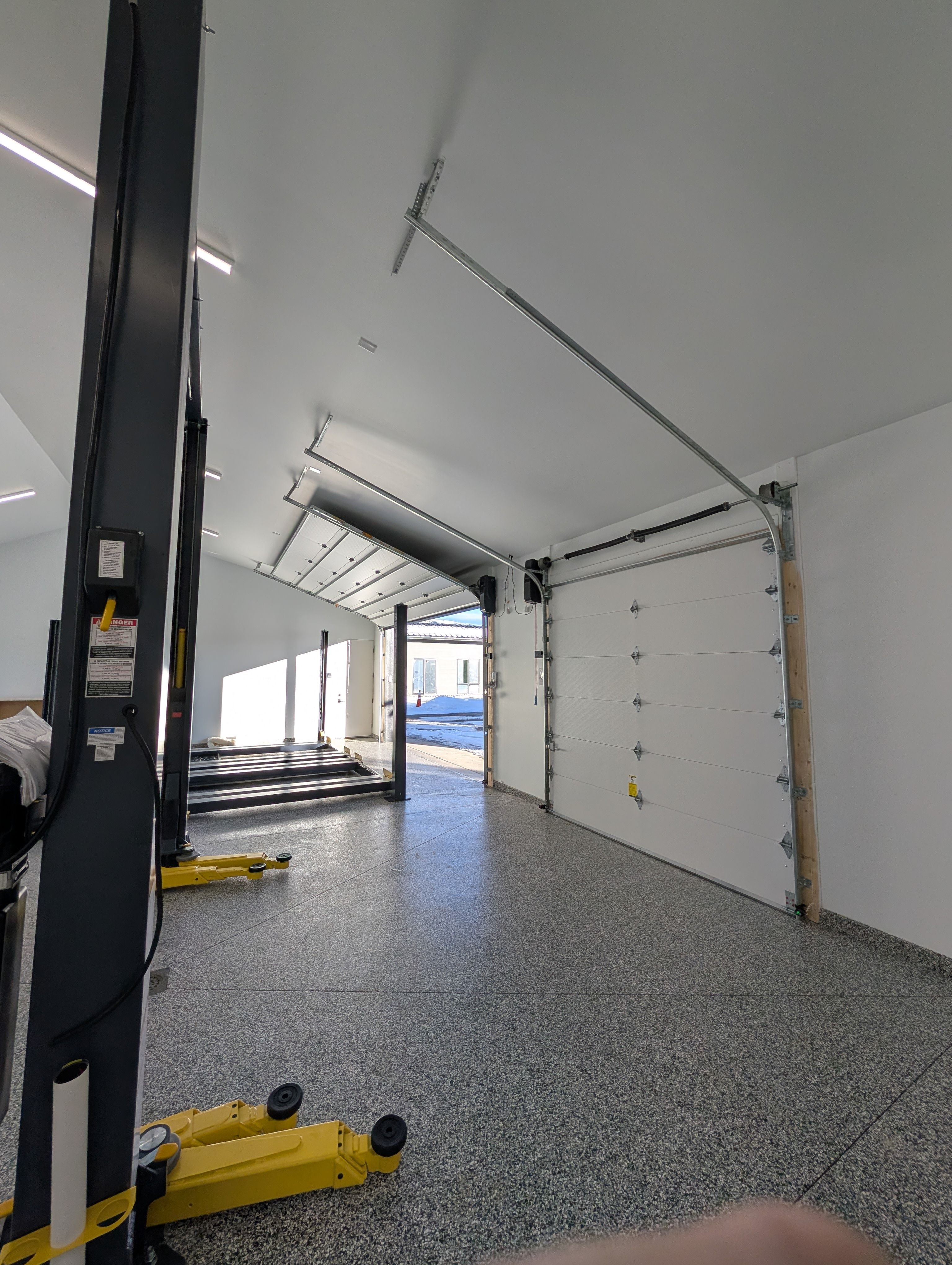 Precision Garage Setup with Custom Door Tracks | Grand Entry Garage Doors