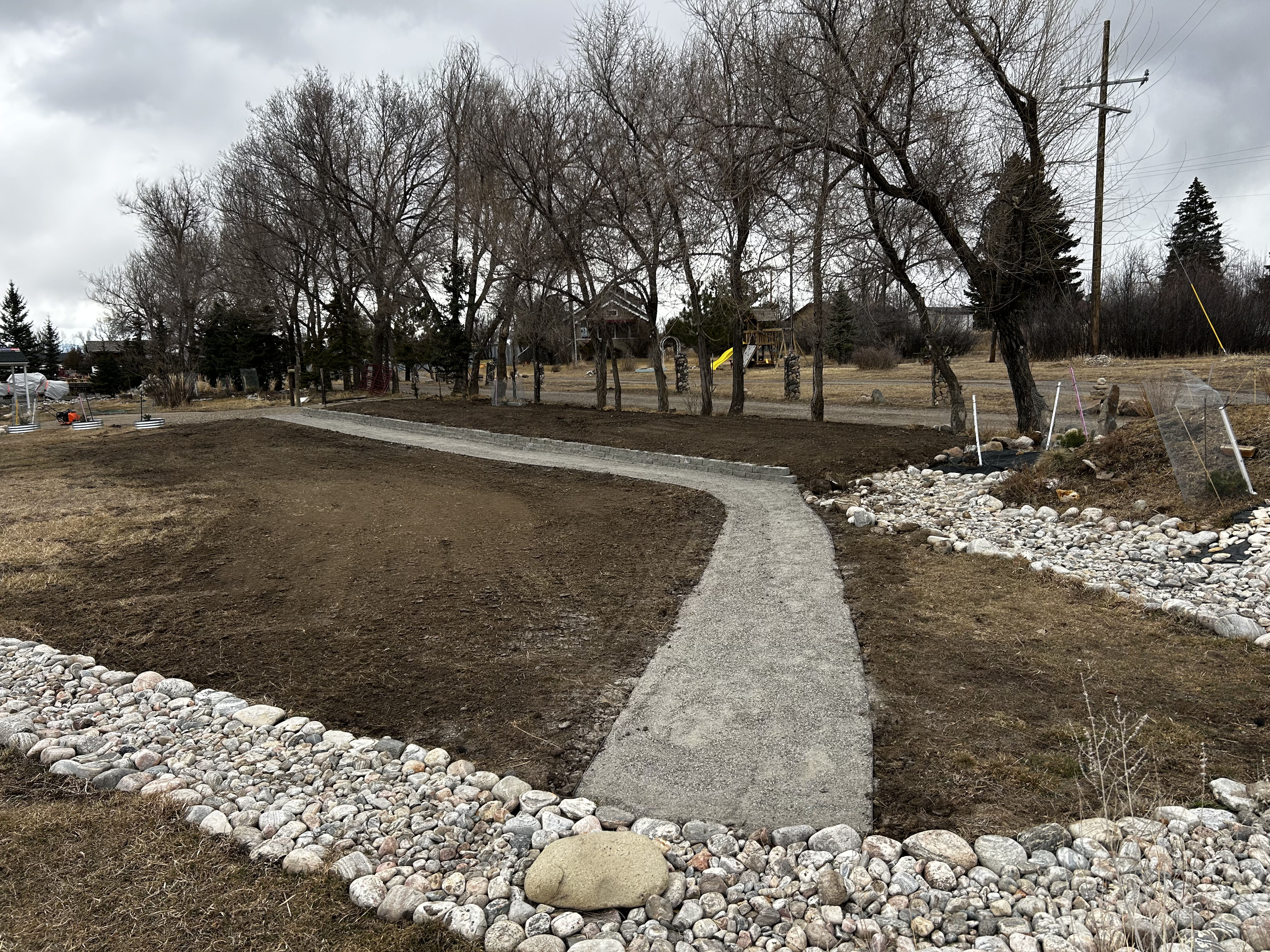 Property Enhancement with Drainage and Pathway Construction in Gallatin ...