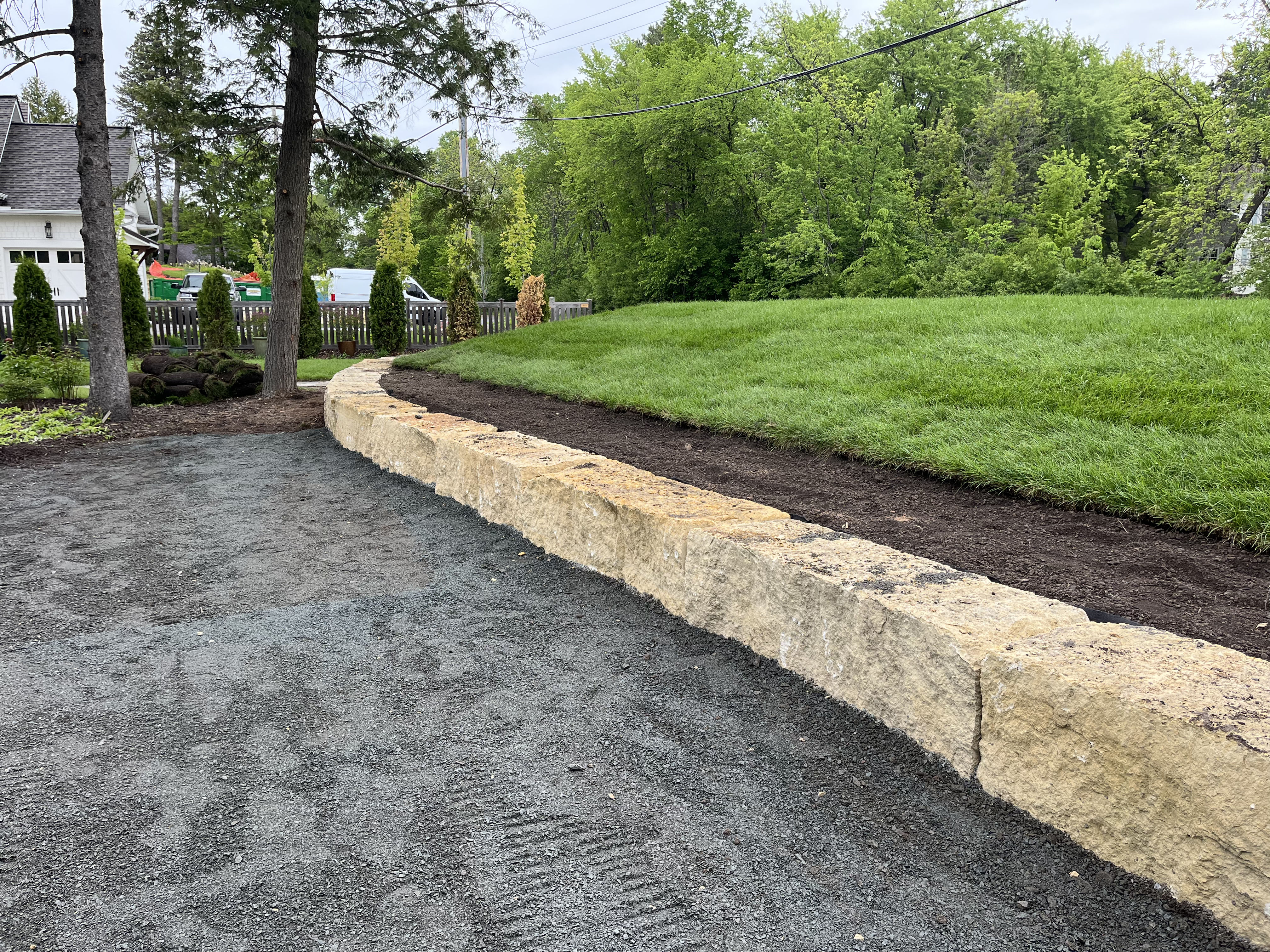 Limestone Boulder Retaining Wall Frames a Septic Mound in Dellwood ...