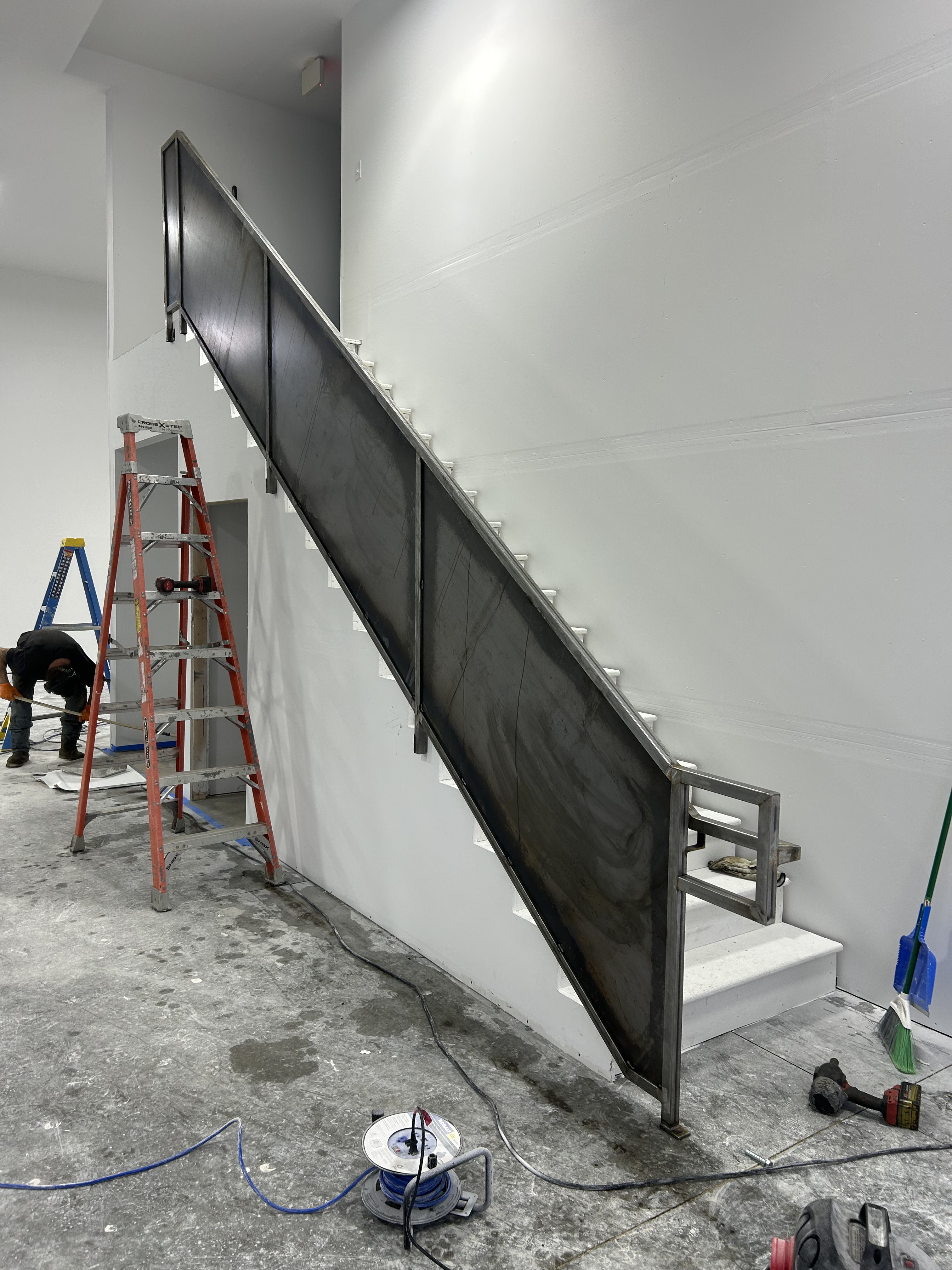Crafting Industrial Elegance with Our Latest Staircase Build | Tomcat's ...