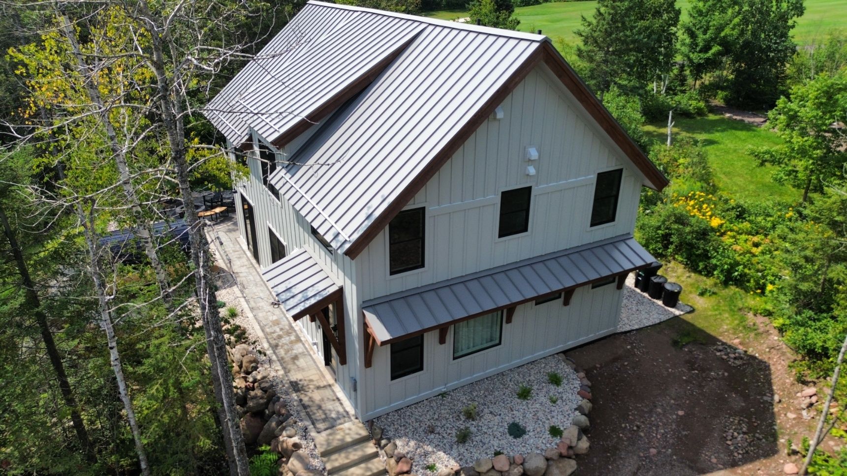 Picture of Transformative Metal Roofing for Nature-Embraced Home | Iron Ridge ...