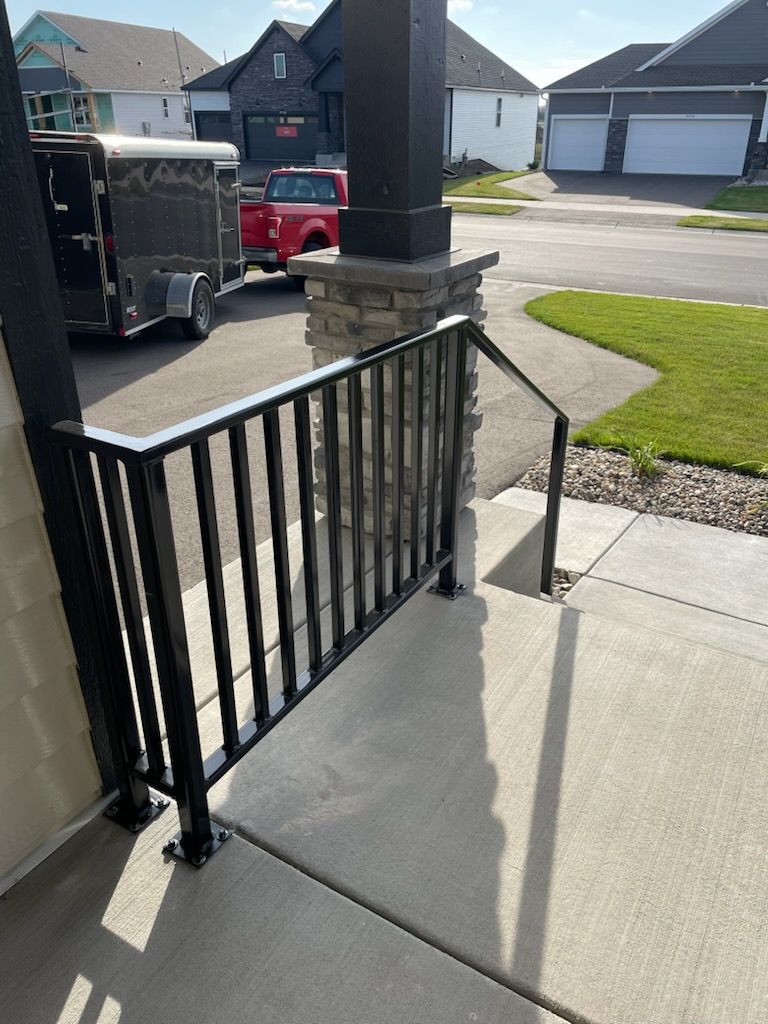 Sleek Metal Railing Installation for Porch Steps | Everything Metal