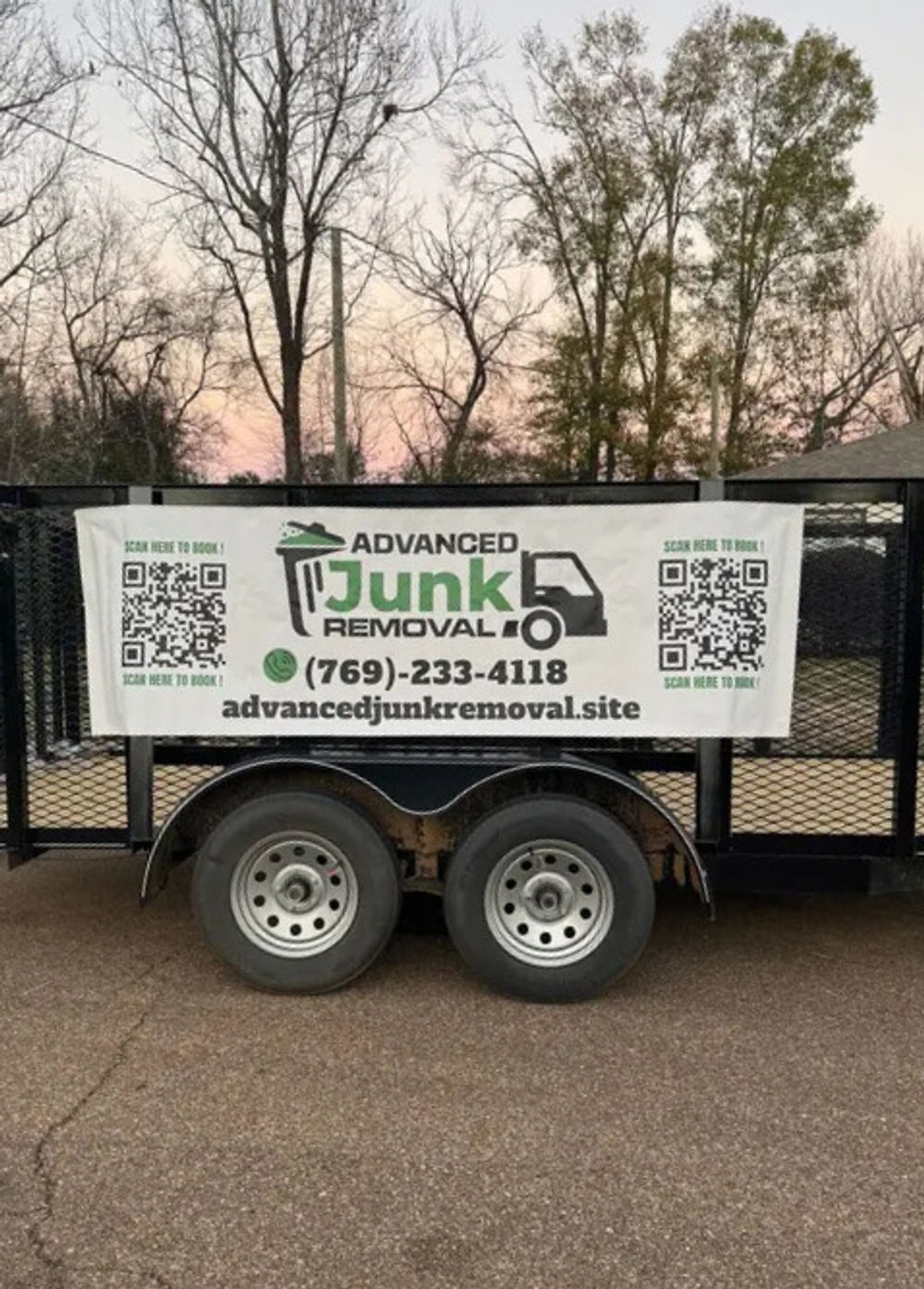 Advanced Junk Removal truck and trailer