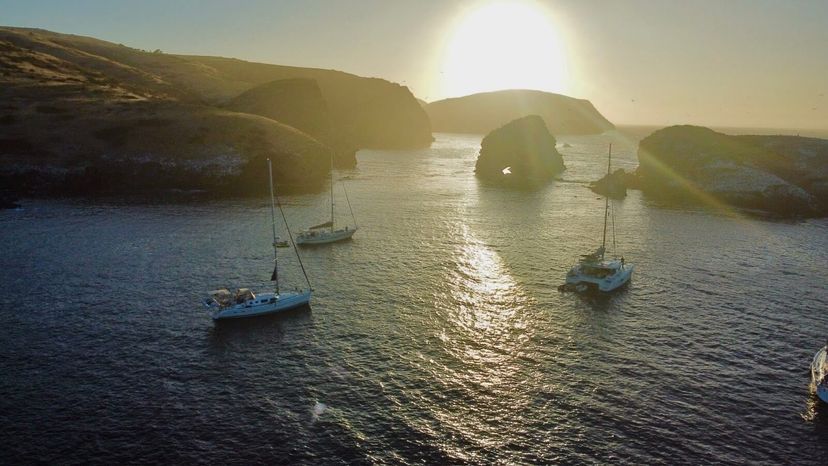 Crew of two elderly women and two men enjoying the Channel Islands flotilla.