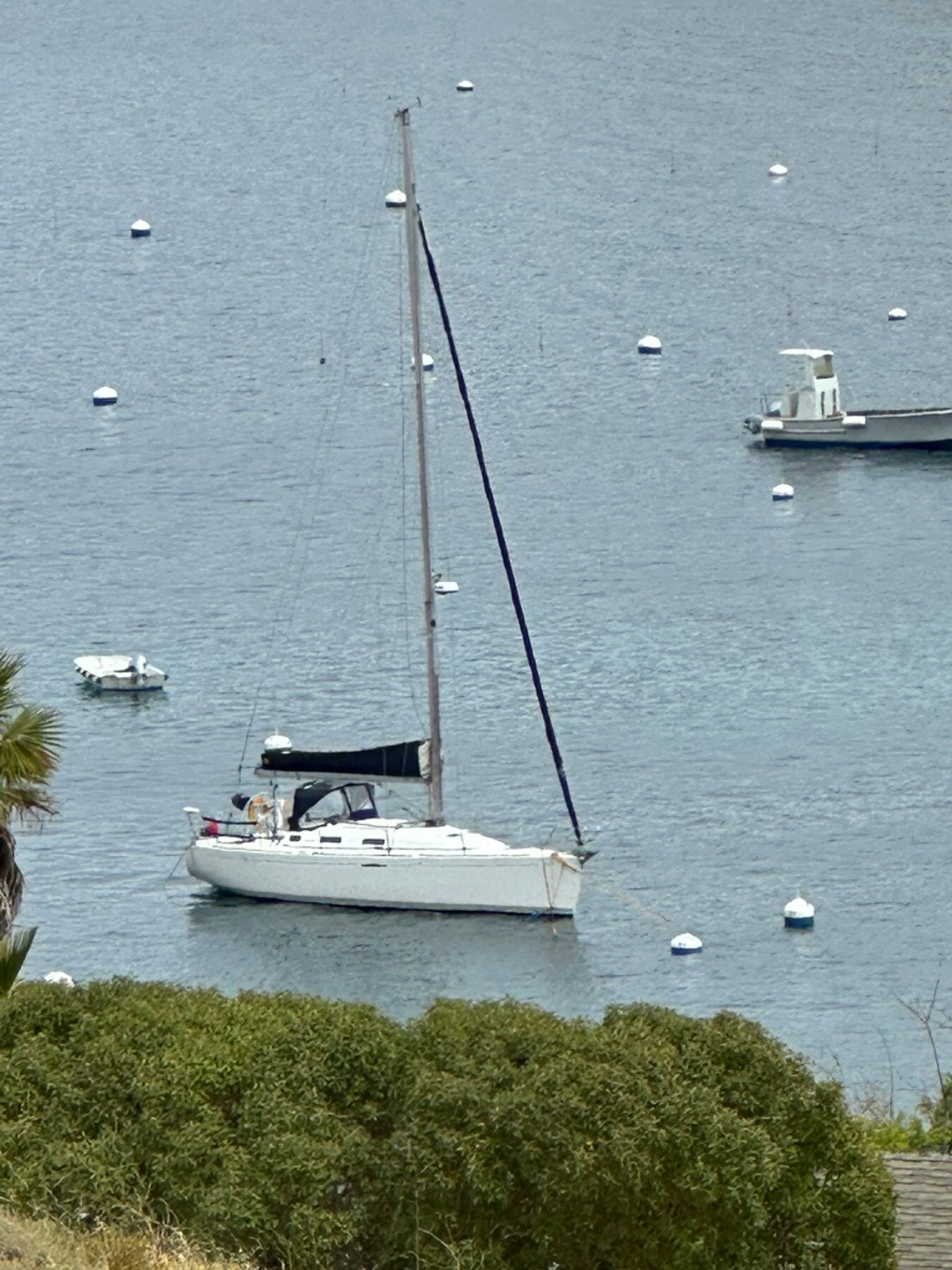 Solo sailboat on a mooring at Two Harbors