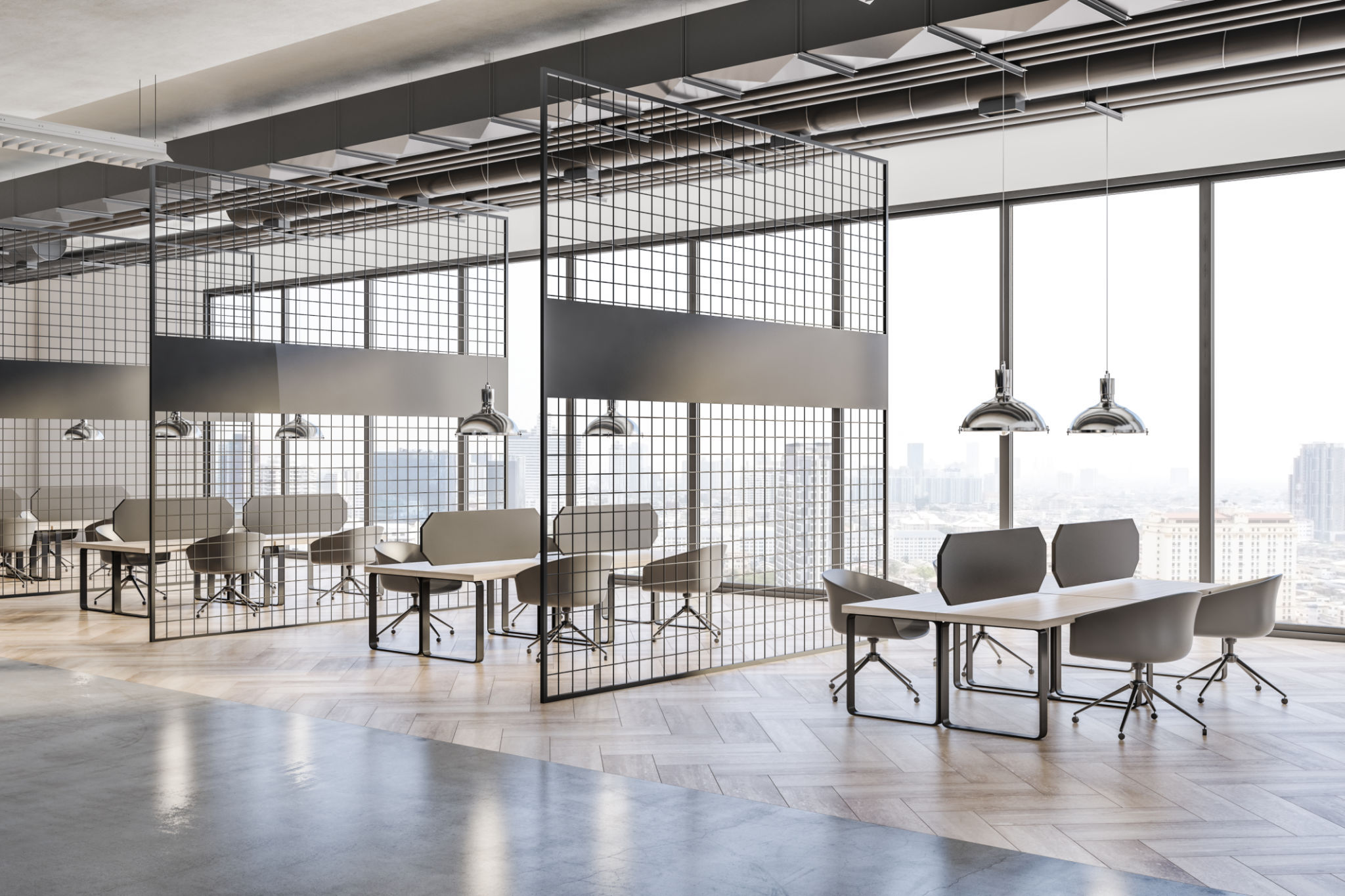 Bureau contemporain Lausanne avec séparations industrielles et espaces de travail flexibles