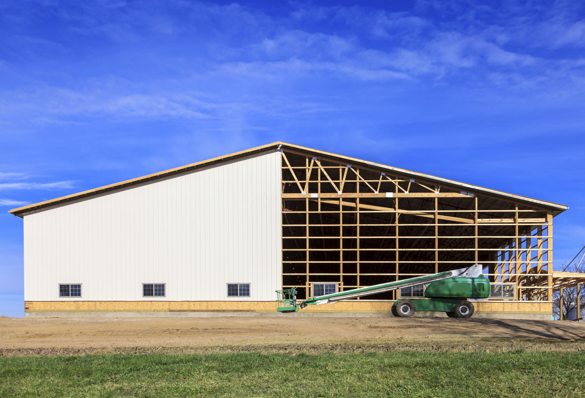 Construction bâtiment agricole ossature bois bardage métallique hangar agricole