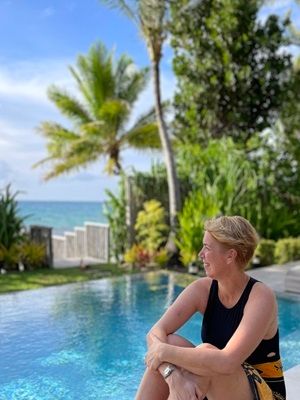 Luxury Travel Fiji Expert Carine Boost by the pool at Kokomo Private Island in Fiji.