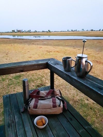 Early morning wake-up call at Eagle Island Lodge, day in the life on an African Safari